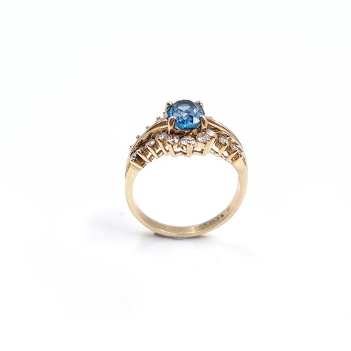 6 - A very pretty nine carat Gold Diamond and Topaz ring. Size - H 1/2, Weight - 2.23 grams.