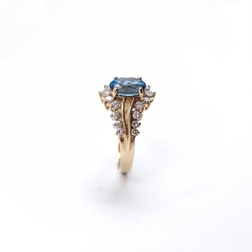 6 - A very pretty nine carat Gold Diamond and Topaz ring. Size - H 1/2, Weight - 2.23 grams.