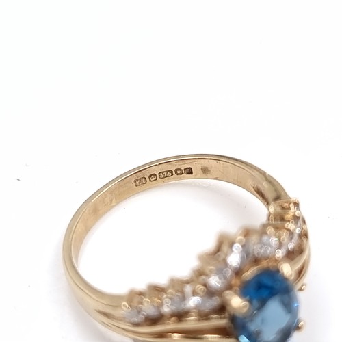 6 - A very pretty nine carat Gold Diamond and Topaz ring. Size - H 1/2, Weight - 2.23 grams.