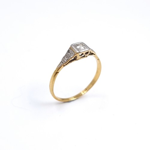 53 - Star Lot : An antique 18 carat gold ring set with Diamond and Diamond shoulder mounts. Stamped 18CT.... 