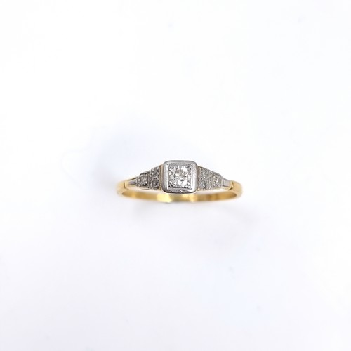 53 - Star Lot : An antique 18 carat gold ring set with Diamond and Diamond shoulder mounts. Stamped 18CT.... 