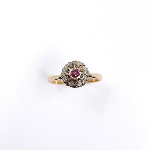 51 - Star lot: An antique Ruby and Diamond Cluster ring set in nine carat gold. Hallmarks indistinct. Siz... 
