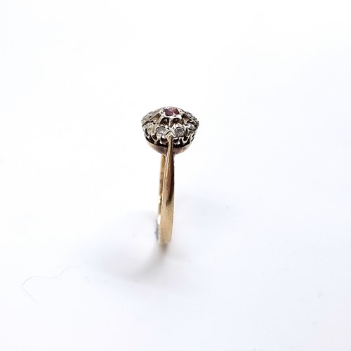 51 - Star lot: An antique Ruby and Diamond Cluster ring set in nine carat gold. Hallmarks indistinct. Siz... 