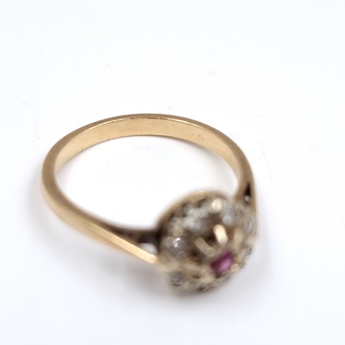 51 - Star lot: An antique Ruby and Diamond Cluster ring set in nine carat gold. Hallmarks indistinct. Siz... 