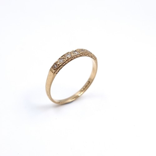 48 - A pretty antique nine carat Gold Diamond set half eternity ring . Size - O 1/2, Weight-  1. 42 grams