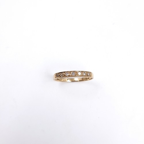 48 - A pretty antique nine carat Gold Diamond set half eternity ring . Size - O 1/2, Weight-  1. 42 grams