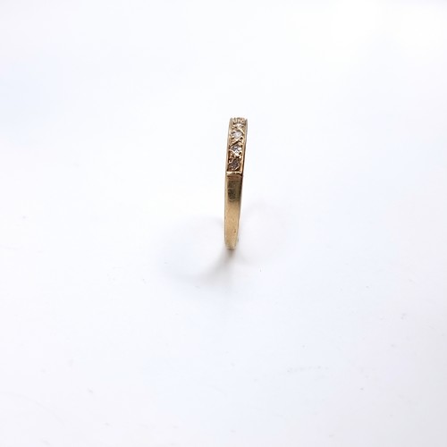 48 - A pretty antique nine carat Gold Diamond set half eternity ring . Size - O 1/2, Weight-  1. 42 grams