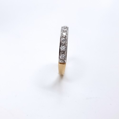 45 - A pretty nine carat gold gemstone half eternity ring. Size - P, Weight - 2. 04 grams.