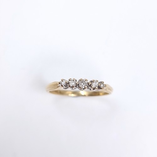 39 - A pretty Diamond set half eternity ring set in nine carat gold 375. Ring Size - O 1/2, Weight - 1.61... 