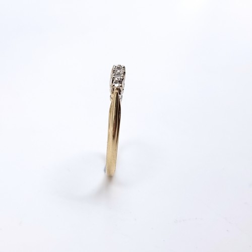 39 - A pretty Diamond set half eternity ring set in nine carat gold 375. Ring Size - O 1/2, Weight - 1.61... 