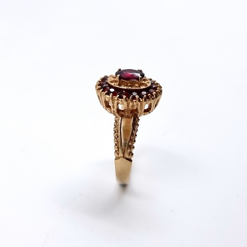 38 - Star Lot : A pretty vintage red tourmaline stone 375 nine carat gold ring. Size - P 1/2, Weight - 3.... 