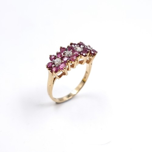34 - Star Lot : A nine carat gold Ruby and Diamond gemstone ring. Size - K, Weight - 2.45 grams.