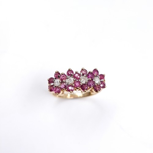 34 - Star Lot : A nine carat gold Ruby and Diamond gemstone ring. Size - K, Weight - 2.45 grams.