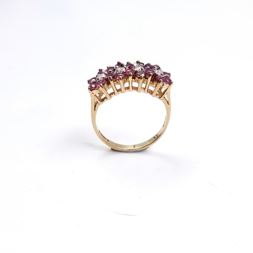 34 - Star Lot : A nine carat gold Ruby and Diamond gemstone ring. Size - K, Weight - 2.45 grams.
