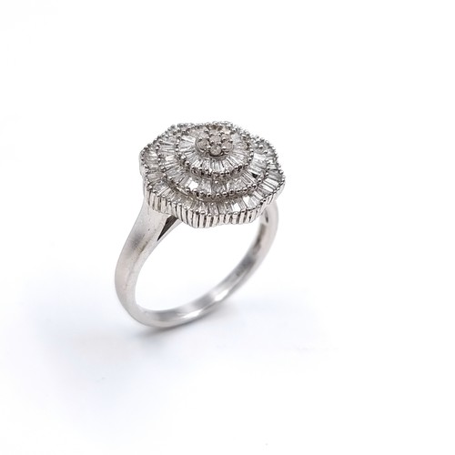 31 - Star Lot : A Stunning Large Diamond spray set ring. Est Weight of Diamonds - 0.45 carats, Size - T. ... 