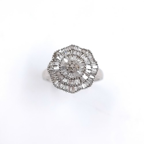 31 - Star Lot : A Stunning Large Diamond spray set ring. Est Weight of Diamonds - 0.45 carats, Size - T. ... 