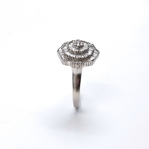 31 - Star Lot : A Stunning Large Diamond spray set ring. Est Weight of Diamonds - 0.45 carats, Size - T. ... 
