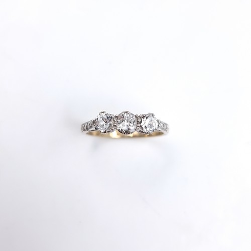 11 - A nine carat gold / Silver gem set ring. Size - O, Weight - 2.1 grams.