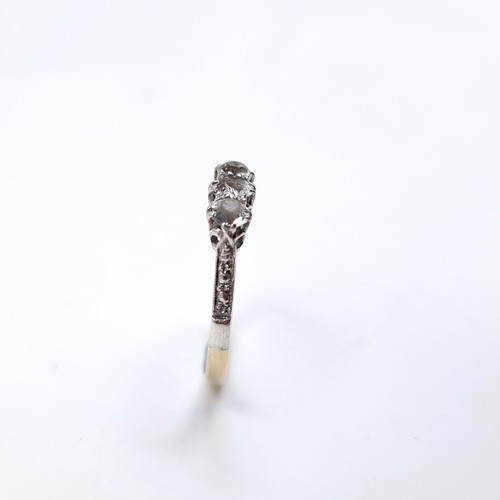 11 - A nine carat gold / Silver gem set ring. Size - O, Weight - 2.1 grams.