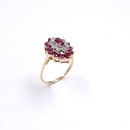 9 - A stunning nine carat gold Ruby and Diamond ring. Size - L, Wight - 2 grams.