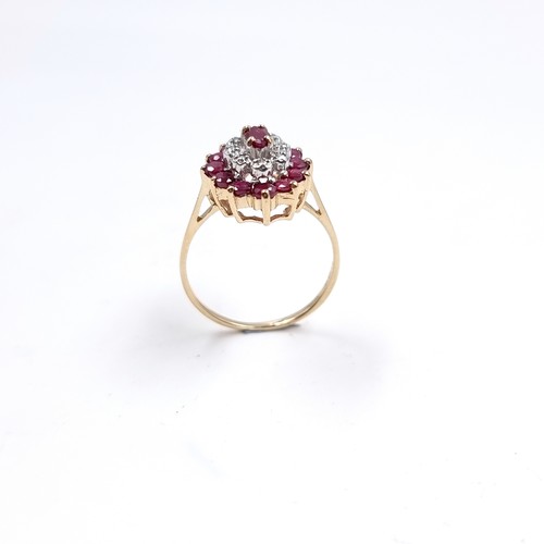 9 - A stunning nine carat gold Ruby and Diamond ring. Size - L, Wight - 2 grams.
