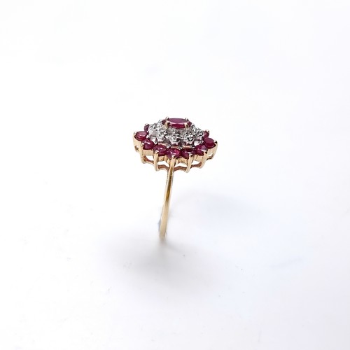 9 - A stunning nine carat gold Ruby and Diamond ring. Size - L, Wight - 2 grams.