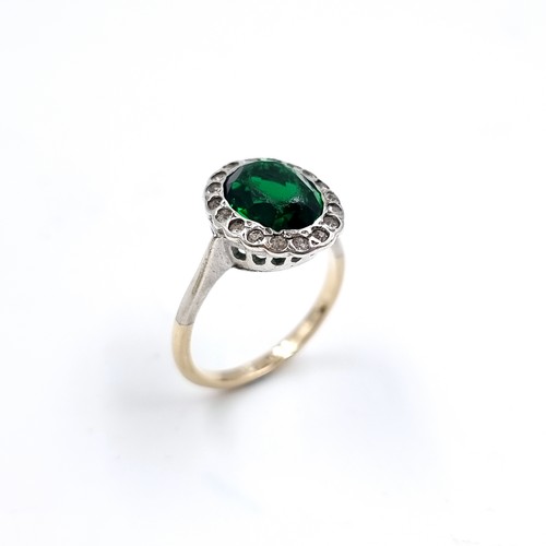 8 - A lovely Gold and Silver gemstone ring. Size - M, weight - 3 grams.