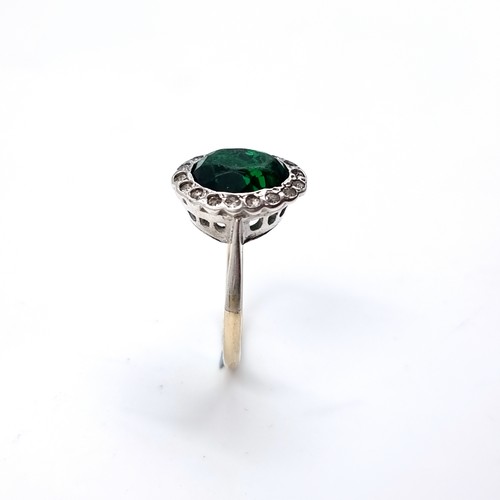 8 - A lovely Gold and Silver gemstone ring. Size - M, weight - 3 grams.