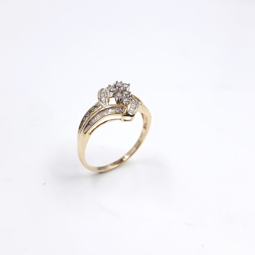 7 - Star Lot : A fabulous nine carat gold Diamond cluster ring with Diamond set shoulders. Size - U 1/2,... 