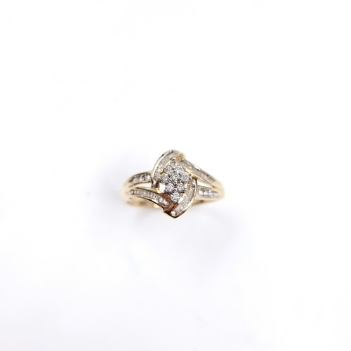 7 - Star Lot : A fabulous nine carat gold Diamond cluster ring with Diamond set shoulders. Size - U 1/2,... 