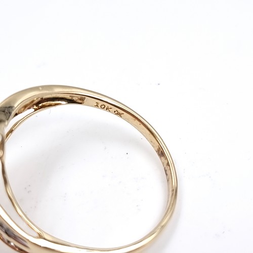 7 - Star Lot : A fabulous nine carat gold Diamond cluster ring with Diamond set shoulders. Size - U 1/2,... 