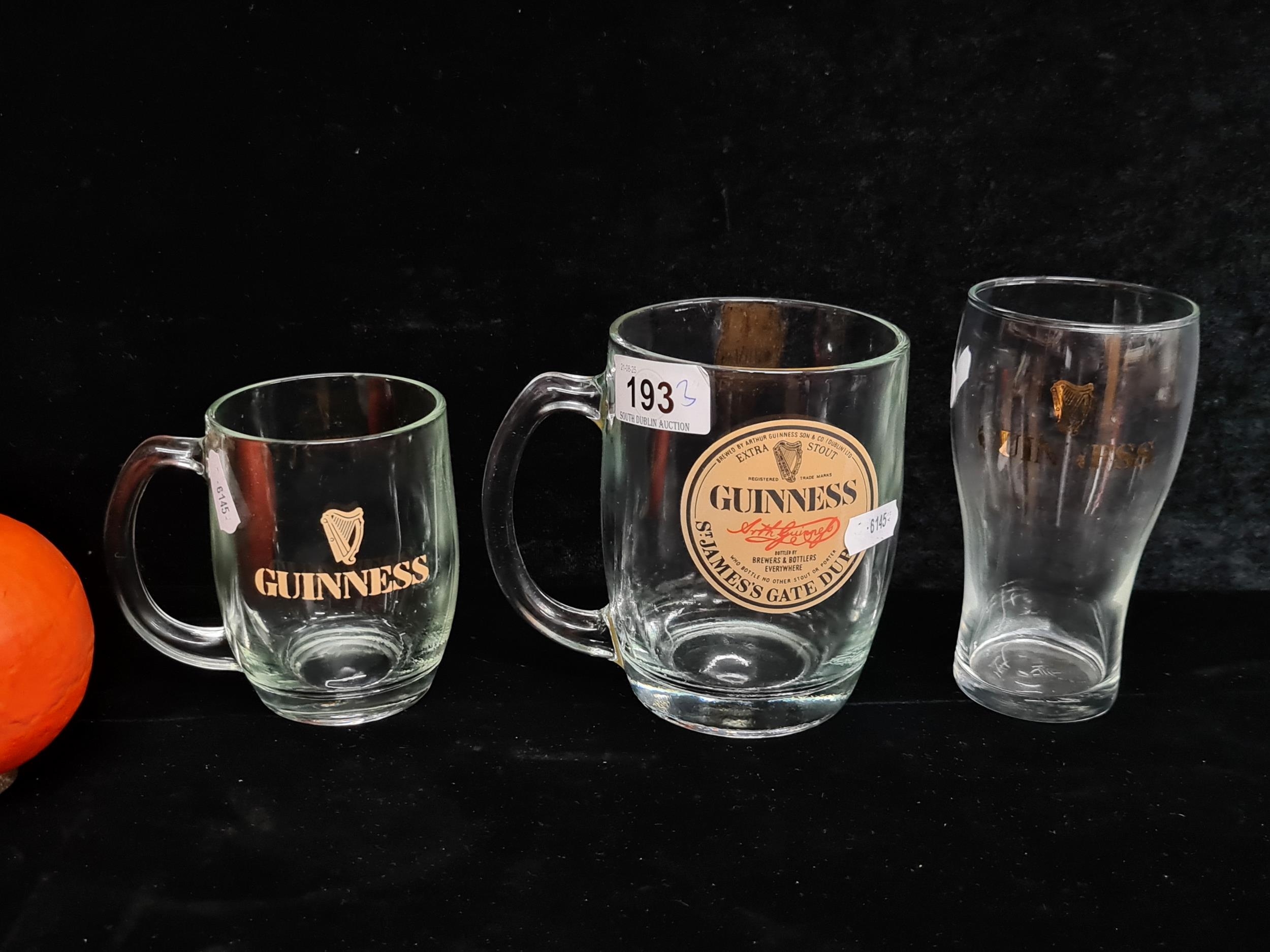 Three vintage Guinness glasses including two half pints and one full ...