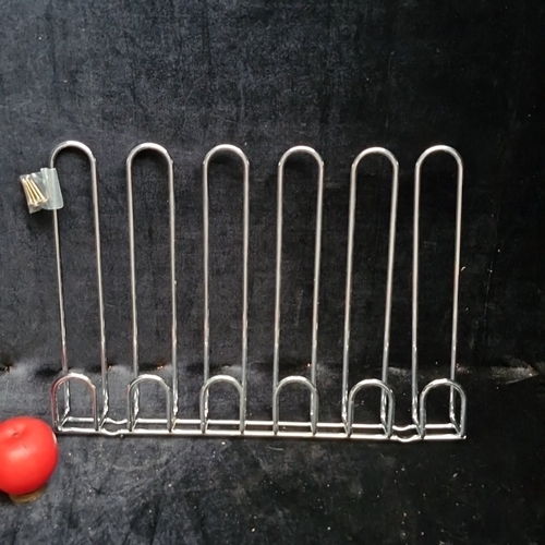 Brand new Chrome-plated steel wall-mounted wire rack providing seven ...