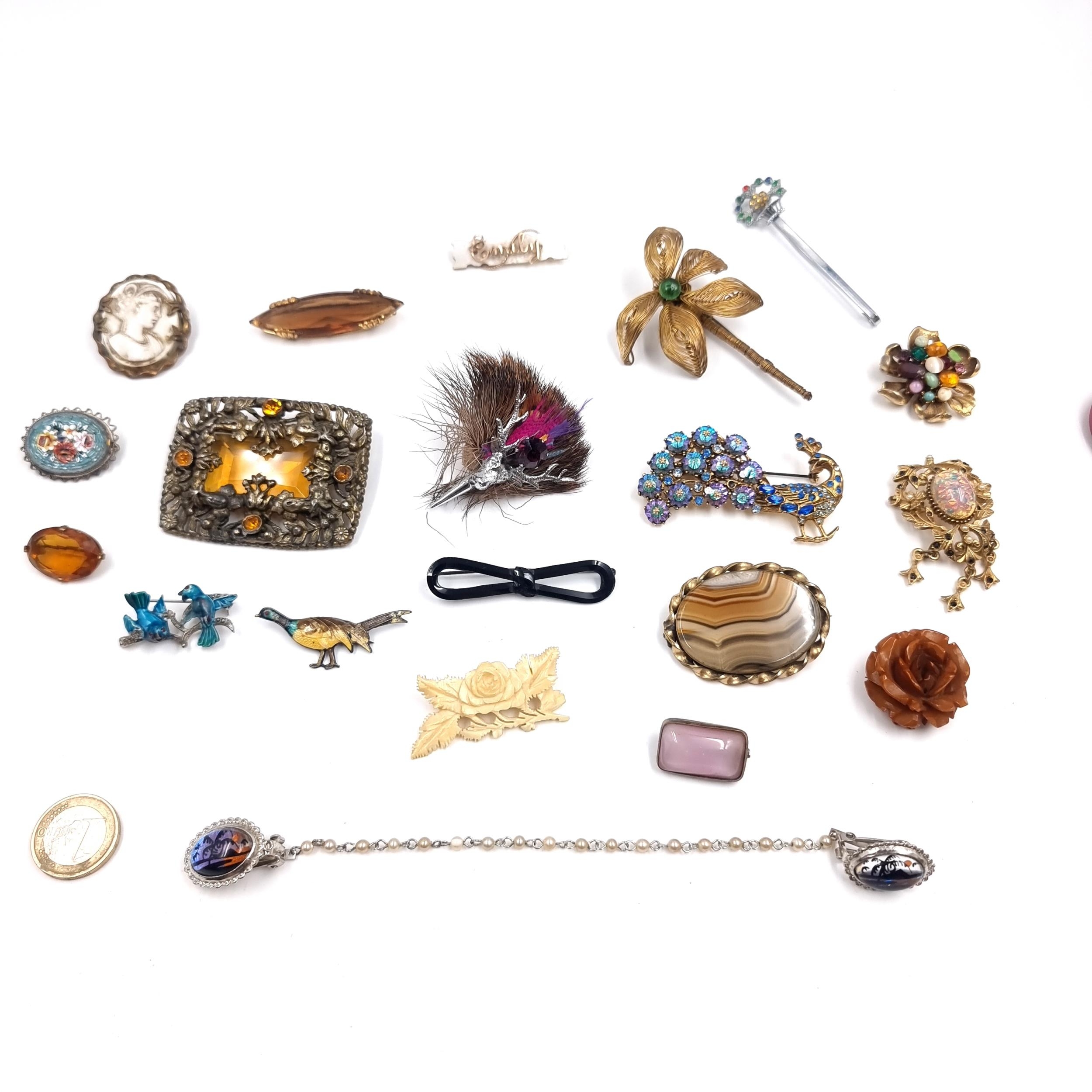 A lovely collection of 20 antique brooches. Of interest a Marcasite ...