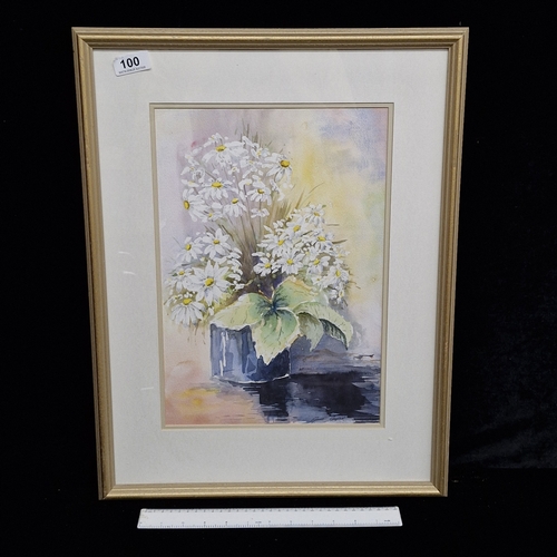 A charming watercolour on paper painting. Features a still life botanical study of daisies in a vase. Rendered in naturalistic colour palette with soft whites, yellows and greens. Portrays loose and fluid brushstrokes. Signed 'Anne Cooper' lower right. Housed in a gilt frame behind glass.