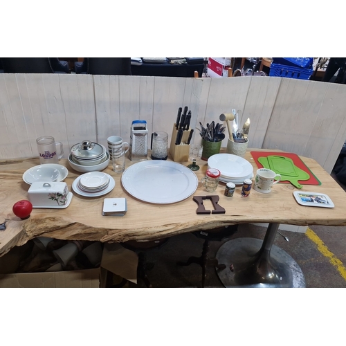 Collection of assorted kitchen and tableware including plates, bowls ...