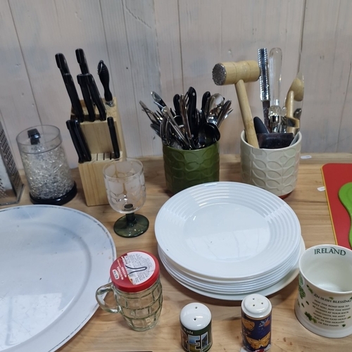 Collection of assorted kitchen and tableware including plates, bowls ...