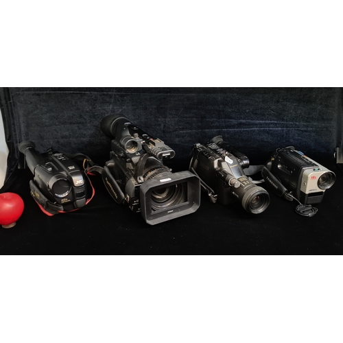 A selection of 4 retro handheld video cameras. Including a Panasonic ...