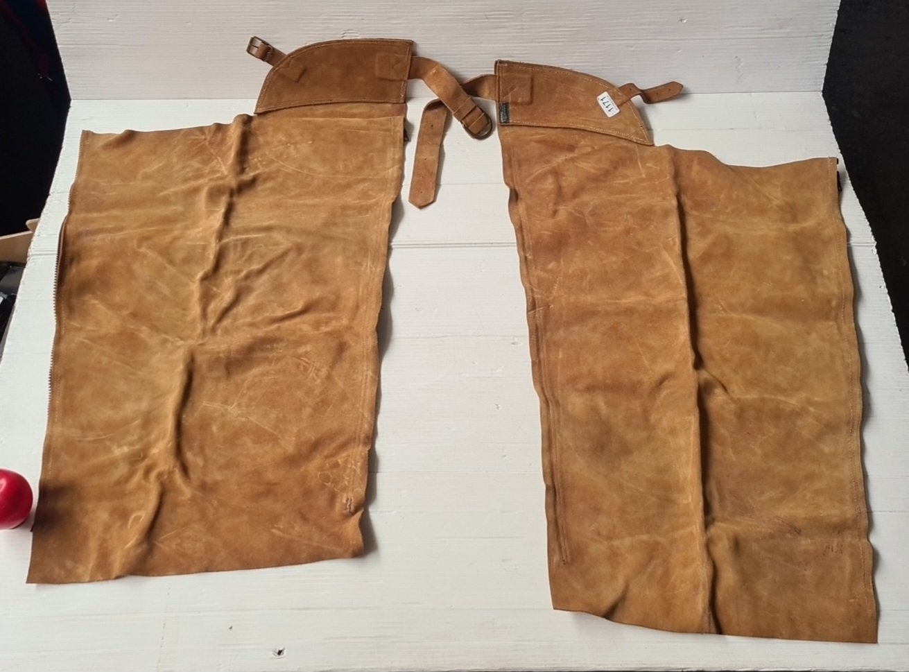 Pair of tan suede leather full-length riding chaps with buckle straps ...