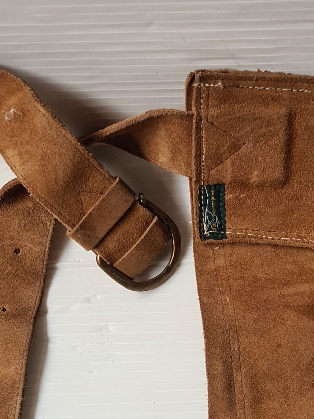 Pair of tan suede leather full-length riding chaps with buckle straps ...