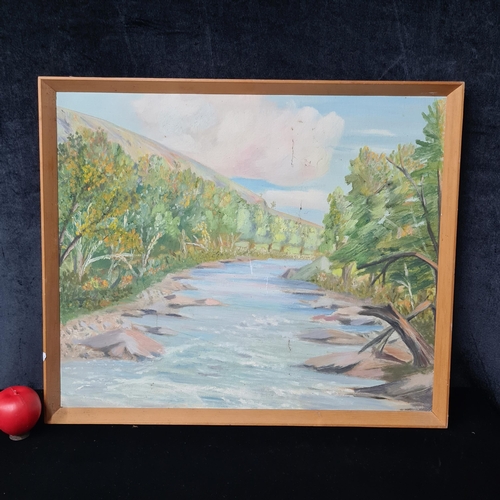 A lively oil on board painting. Features a riverside landscape with lush trees, blue skies and waters. Rendered in rich greens, ochres, yellows, blues, soft lilacs and pinks. Portrays broad and impressionist brushstrokes. Housed in a wooden frame.

Previous in auction on T131125  - 16/11/2025 with Lot no.856

Previous in auction on T201125  - 23/11/2025 with Lot no.1182

Previous in auction on T271125  - 30/11/2025 with Lot no.1455

Previous in auction on T041225  - 07/12/2025 with Lot no.1593