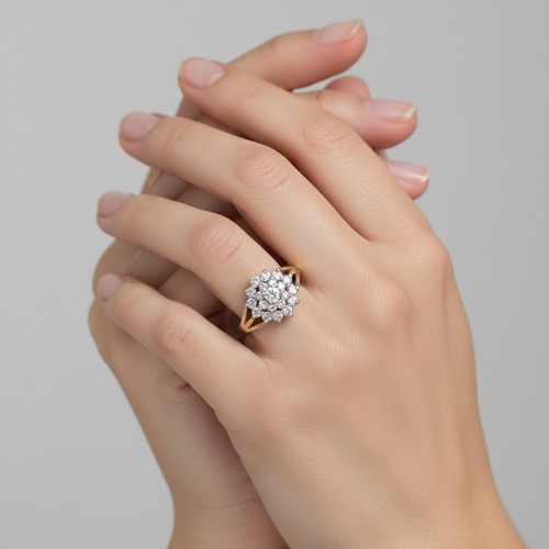 4 - Star Lot: An outstanding Diamond cluster ring. Estimated size of carats - 0.5 carats.  Size - M, Wei... 