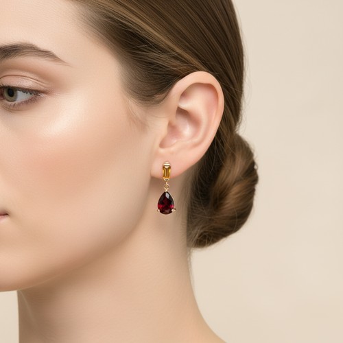 19 - Star Lot : A beautiful pair of Garnet and Citrine drop pendant earrings set in nine carat gold. Weig... 