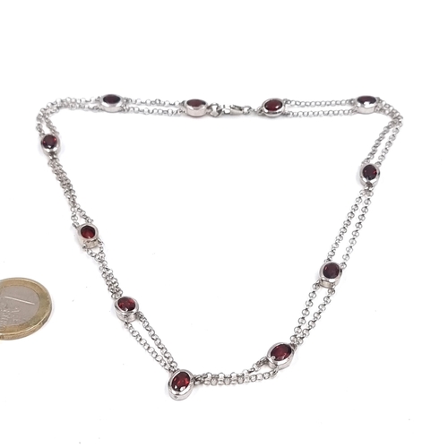 1670 - A really nice Sterling Silver 925 Eleven panel Garnet double strand necklace.

Previous in auction o... 