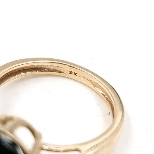 13 - Star Lot: An Aurora Borealis and Diamond shoulder set nine carat gold ring. Size - J 1/2, Weight - 2... 