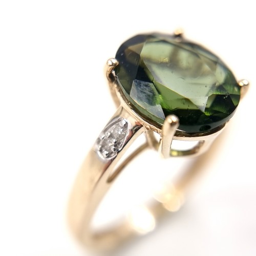 13 - Star Lot: An Aurora Borealis and Diamond shoulder set nine carat gold ring. Size - J 1/2, Weight - 2... 