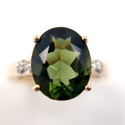 13 - Star Lot: An Aurora Borealis and Diamond shoulder set nine carat gold ring. Size - J 1/2, Weight - 2... 