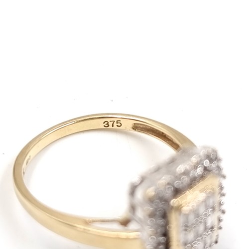 14 - Super Star Lot: A fine Diamond panel ring set in nine carat gold. Estimated weight of Diamonds - O.5... 