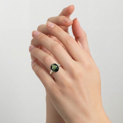 13 - Star Lot: An Aurora Borealis and Diamond shoulder set nine carat gold ring. Size - J 1/2, Weight - 2... 