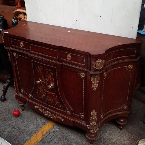 1673 - Star Lot : Serpentine mahogany sideboard with parquetry panels and floral marquetry doors, three fri... 